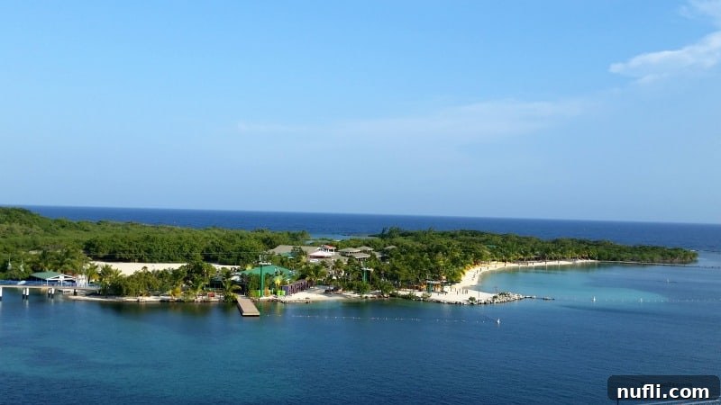 Mahogany Bay Roatan Cruise Haven 4 looking out over a tropical island with buildings and sandy beach