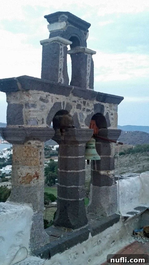 Patmos: St. John's Monastery and the Cave of Apocalypse 5 Historic church bells against a blue sky at St. John's Monastery in Patmos, Greece