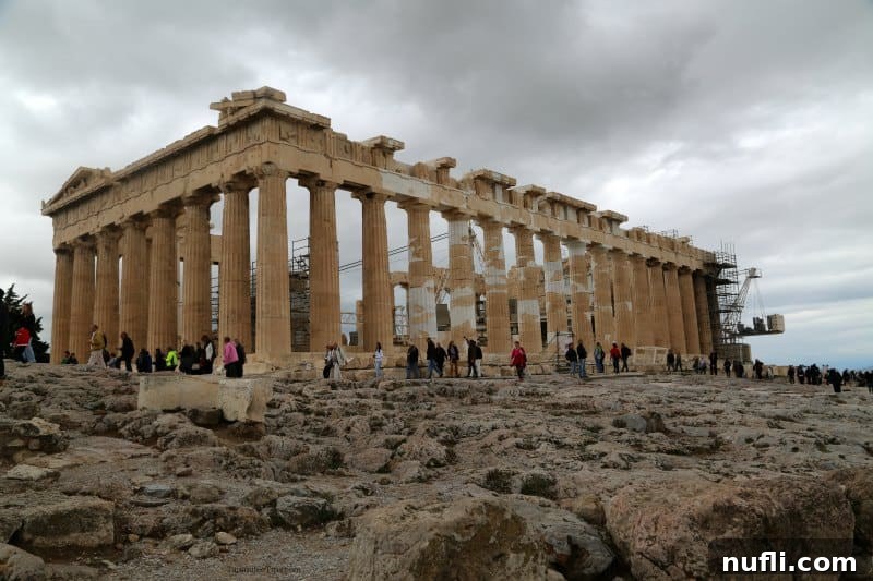 Exploring the Acropolis: Athens' Ancient Wonder 3 Acropolis with people around it