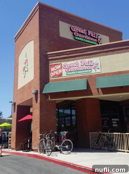 Great Full Garden sign adorning the side of a charming brick building