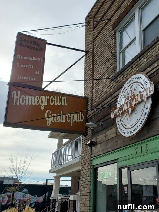 Homegrown Gastropub sign on a brick building 