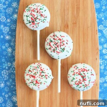 Holiday Oreo Treats on a wood cutting board
