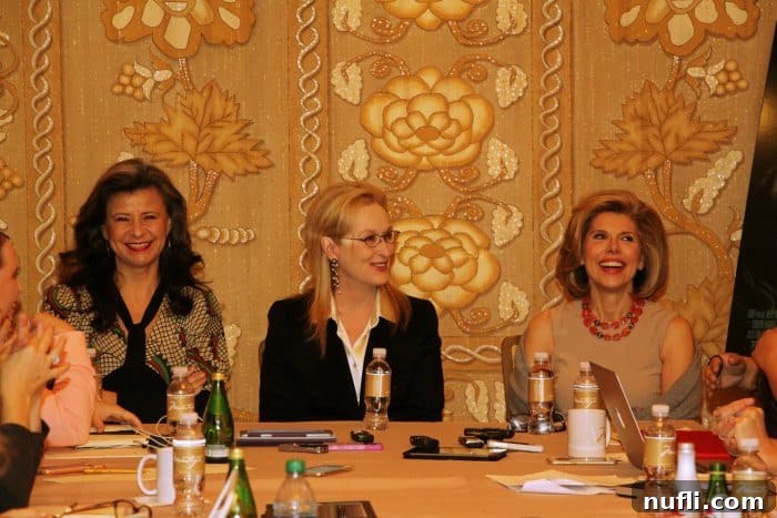 Meryl Streep, Christine Baranski and Tracey Ullman sharing an intimate moment