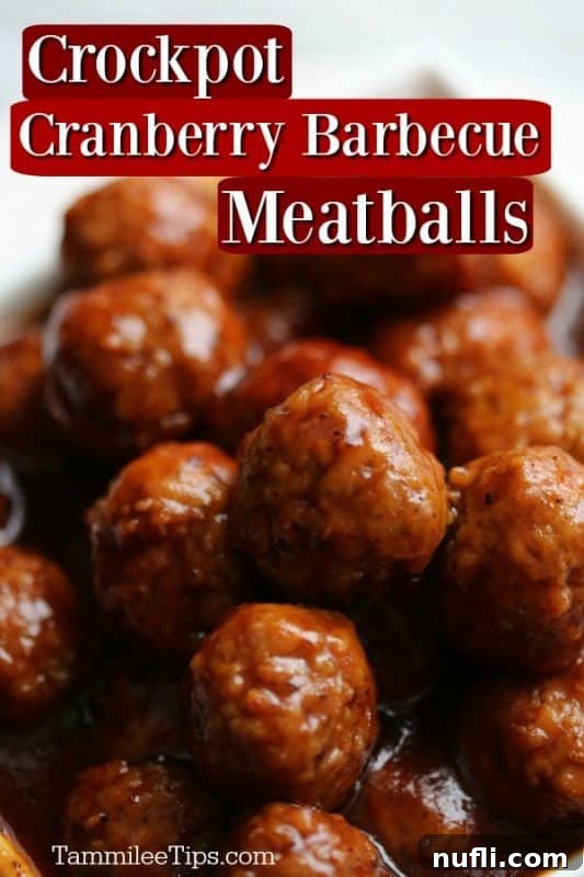 Delicious crockpot cranberry barbecue meatballs served in a elegant white bowl, perfect for parties.