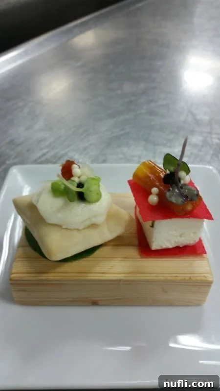 Carnival Sunshine's Exclusive Chef's Table 5 Fresh Buffalo Mozzarella Crudo artfully presented on an air pillow, a testament to innovative culinary design