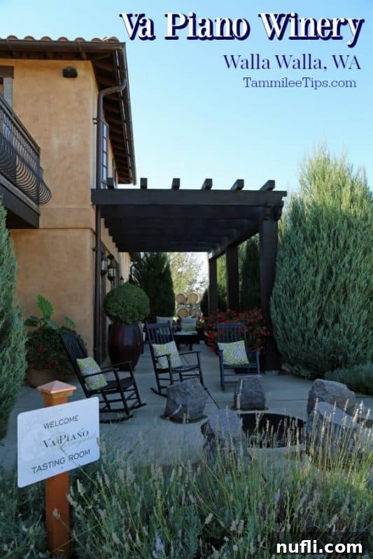 Va Piano Winery Walla Walla over the entrance with rocking chairs and a fire pit