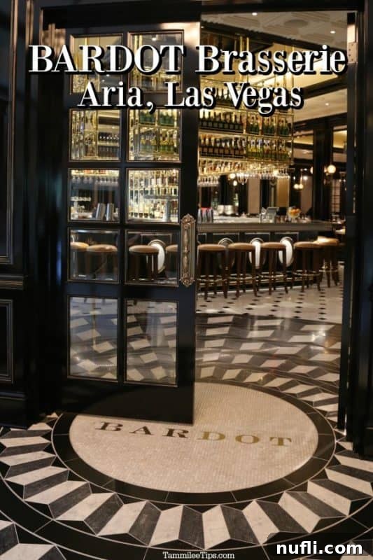 Bardot Brasserie Aria Las Vegas over the entrance to the restaurant, showcasing its inviting and elegant facade.