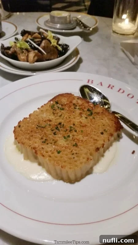 Vertical macaroni and cheese, beautifully plated on a Bardot dish, showcasing its perfectly aligned macaroni and rich cheese sauce.