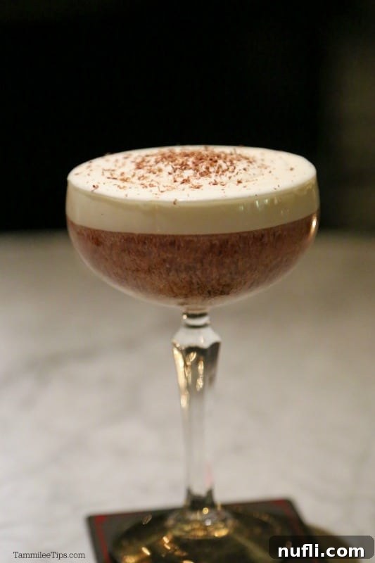 Bardot Brasserie at Aria: An Epicurean Revelation 10 A sophisticated cocktail with chocolate shavings, embodying elegance and flavor.