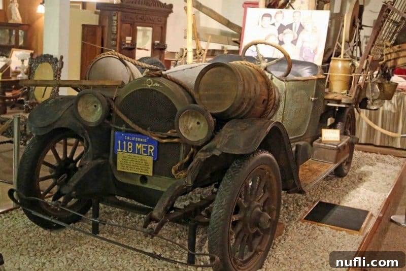 The iconic original vehicle from 'The Beverly Hillbillies' television series, displayed at the Ralph Foster Museum.