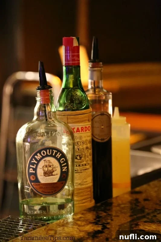 Aviation Cocktail: A Flight of Flavors 3 Plymouth Gin, Luxardo liqueur, and creme de violet at a bar