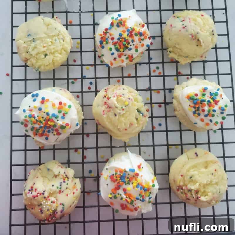 FunFetti Cake Mix Cookies on a wire rack, colorful and cheerful