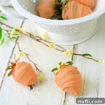 Easter Carrot Strawberries next to a white bowl, ready to be served as a festive treat