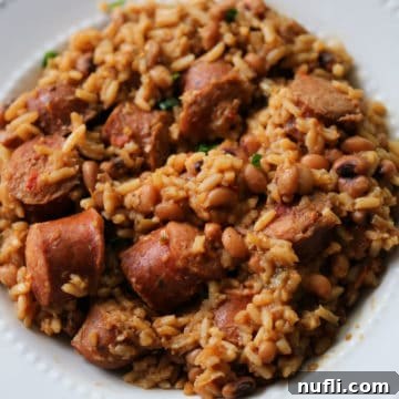 crockpot hoppin john on a white plate