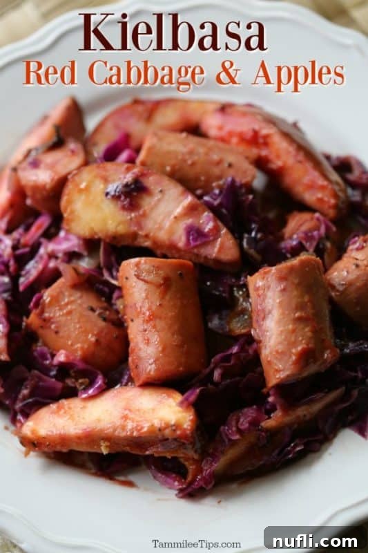 Crock Pot Kielbasa with Red Cabbage and Apples 2 Kielbasa red cabbage and apples over a white plate with cooked kielbasa, apples, and cabbage