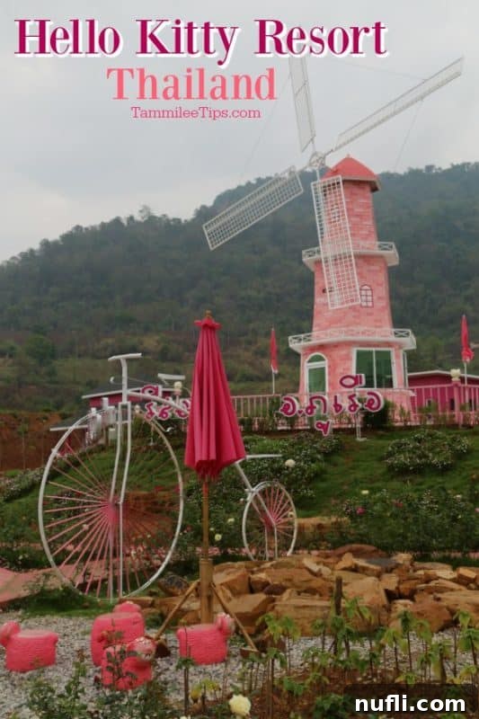 Hello Kitty themed resort in Thailand featuring a pink bike and windmill