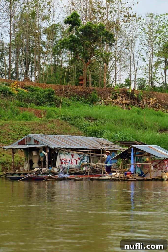 Charming fishing hut on stilts over the Mekong River