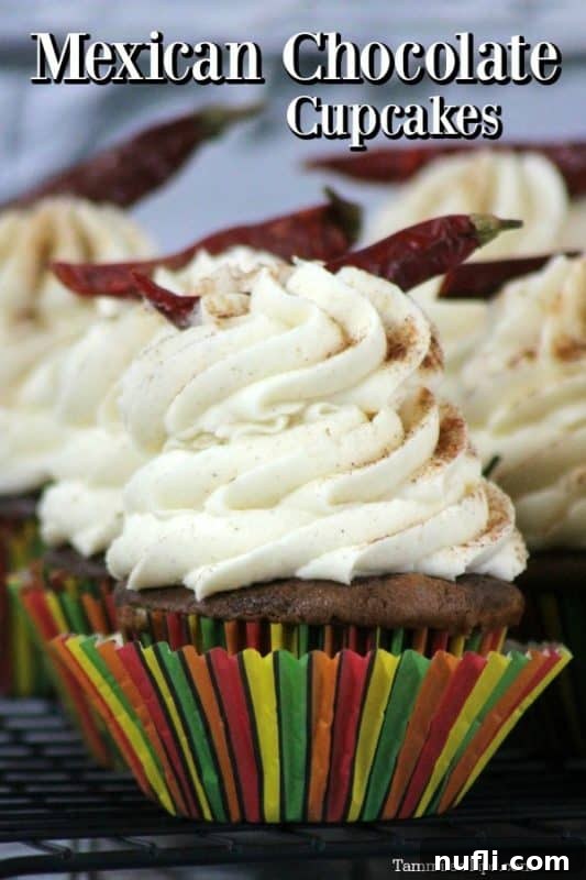 Mexican Chocolate Cupcakes over a cupcake with a pepper on top of it