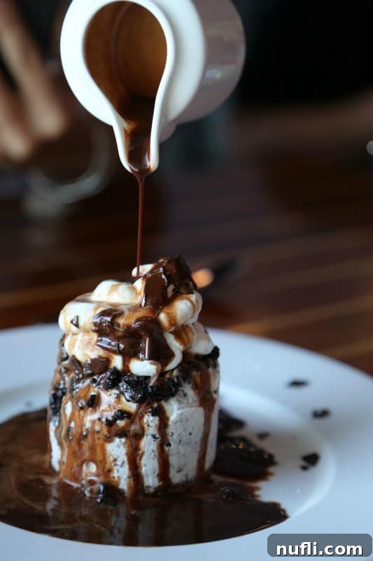 Waterfront Flavors of Monterey's Cannery Row 6 Chocolate syrup poured over ice cream dessert in a bowl