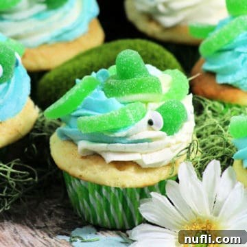 Another view of the cute Turtle Cupcake with a green striped liner, ready for an ocean-themed party.