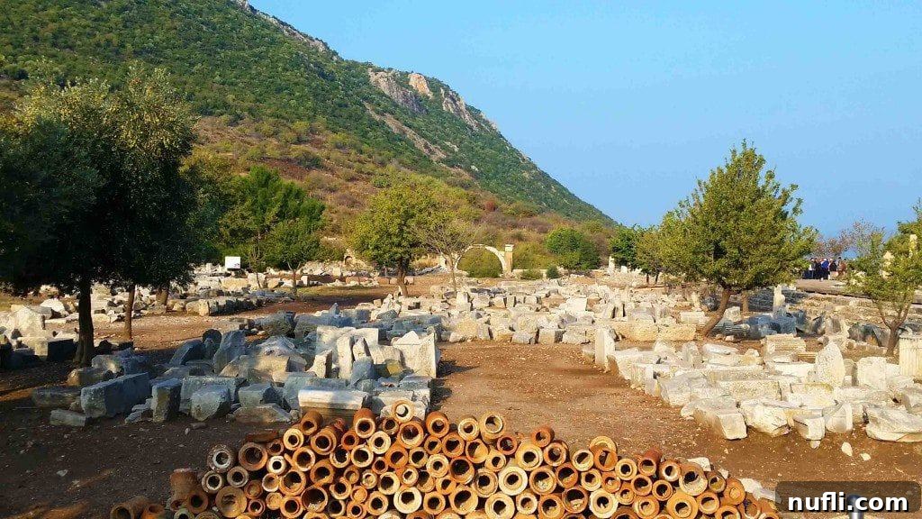 Ancient Roman lead water pipes and plumbing system exposed in Ephesus, demonstrating advanced engineering.
