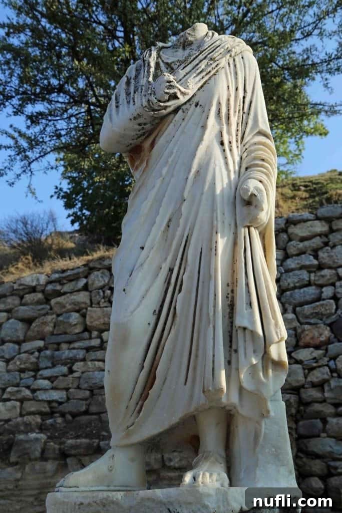 A beautifully preserved ancient statue head from Ephesus, showcasing classical Roman sculpture.