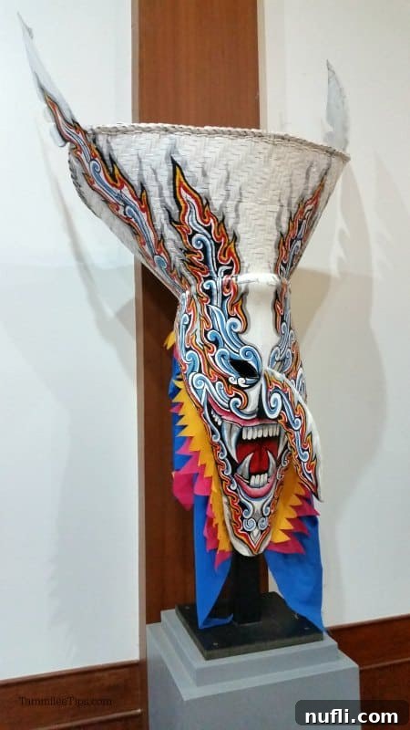 Ornate Phi Ta Khon Mask on display